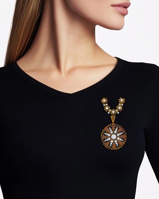 Lot 114 - Buccellati Two-Color Gold, Blackened Silver and Diamond Brooch with Chain Attachment