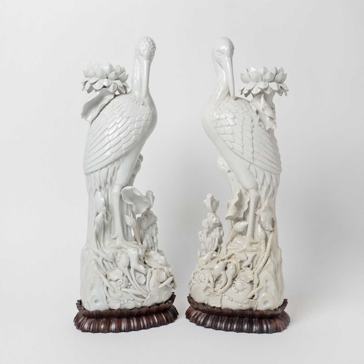 Lot 523 - Pair of Blanc de Chine Porcelain Figures of Cranes