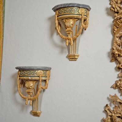 Lot 525 - Set of Four Continental Neoclassical Painted and Parcel-Gilt Wall Brackets