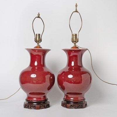 Lot 534 - Pair of Chinese Sang de Boeuf Glazed Porcelain Lamps