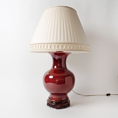 Lot 534 - Pair of Chinese Sang de Boeuf Glazed Porcelain Lamps