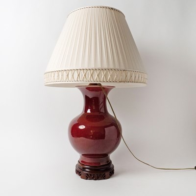Lot 534 - Pair of Chinese Sang de Boeuf Glazed Porcelain Lamps