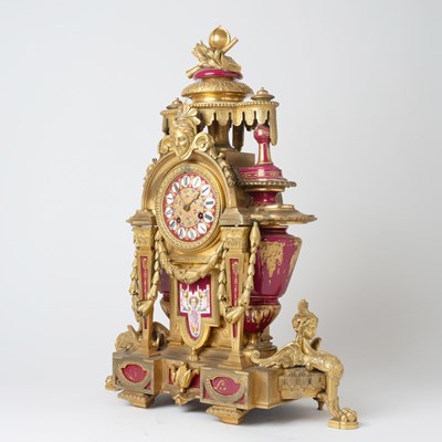 Lot 595 - French Sevres Style Gilt-Bronze and Red Ground Porcelain Mantle Clock