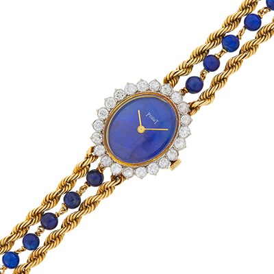 Lot 36 - Piaget Triple Strand Gold, Lapis, Lapis Bead and Diamond Rope-Twist Chain Bracelet-Watch