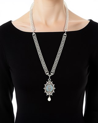 Lot 182 - E. M. Gattle & Co. Belle Epoque Seed Pearl, Platinum, Diamond, Guilloché Blue Enamel and Natural Pearl Pendant-Watch Sautoir