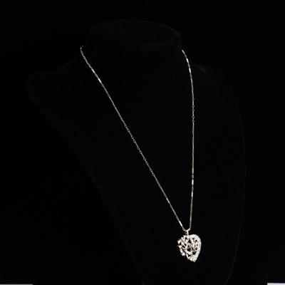 Lot 127 - 14KT White Gold and Diamond Heart Pendant Necklace