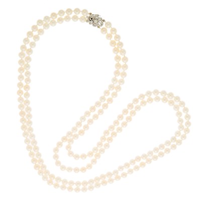 Lot 2054 - Long Double Strand Freshwater Pearl Necklace with White Gold and Diamond Clasp