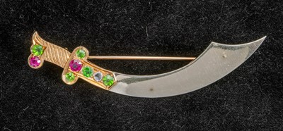 Lot 312 - Two-Color Gold, Demantoid Garnet, Synthetic Ruby and Diamond Sword Brooch
