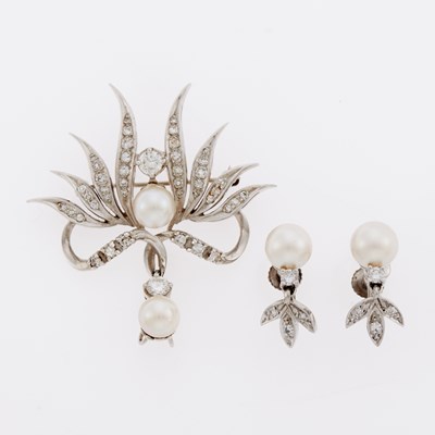 Lot 3263 - White Gold, Cultured Pearl and Diamond Pendant-Brooch and Pair of Pendant-Earclips