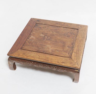 Lot 100 - A Chinese Elmwood Kang Table