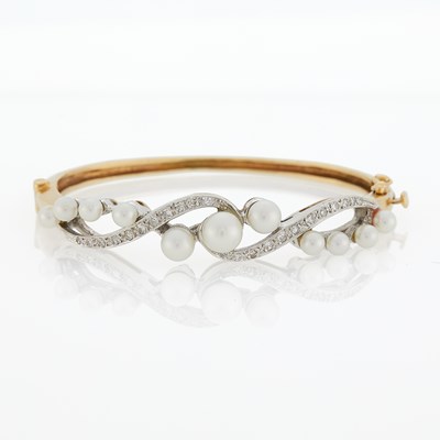 Lot 3319 - Two-Color Gold, Cultured Pearl and Diamond Bangle Bracelet