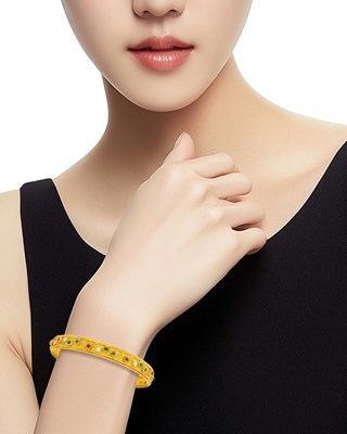 Lot 110 - Van Cleef & Arpels Gold, Cabochon Colored Stone and Diamond Bangle Bracelet and Ring, France