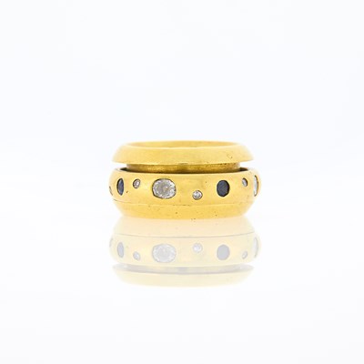 Lot 2011 - Gold, Sapphire and Diamond Spinning Band Ring