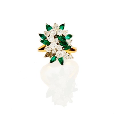 Lot 1113 - Two-Color Gold, Emerald and Diamond Ring