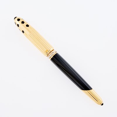 Lot 3331 - Must de Cartier Gilt-Metal and Black Enamel 'Panthère de Cartier' Fountain Pen