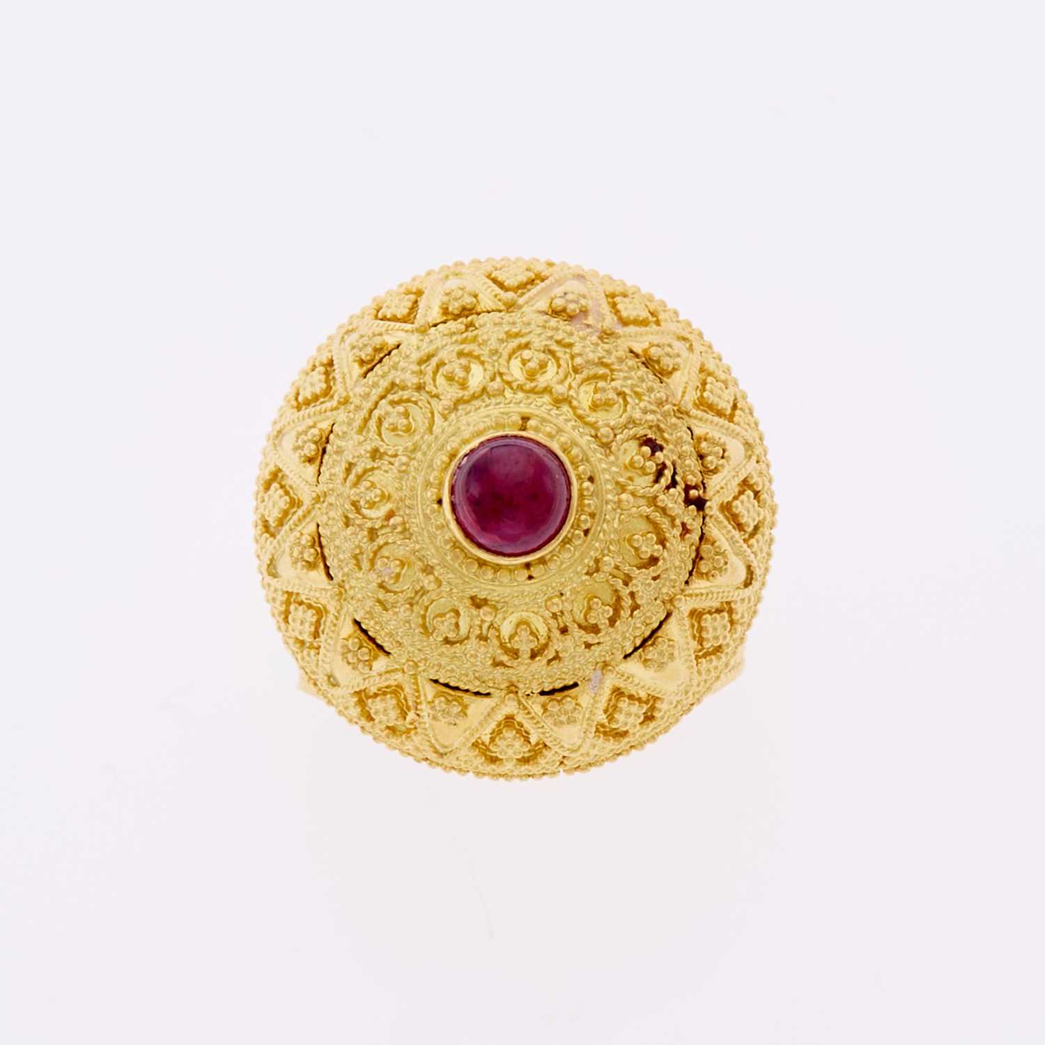 Lot 3016 - Ilias Lalaounis High Karat Gold and Cabochon Ruby 'Byzantine' Dome Ring