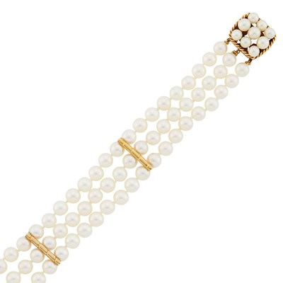 Lot 3265 - Triple Strand Cultured Pearl and Gold Bracelet