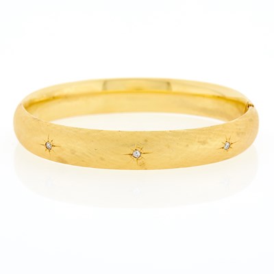 Lot 3199 - Gold and Diamond Bangle Bracelet