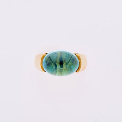 Lot 3090 - Gold and Cabochon Blue Topaz Ring