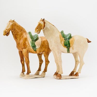 Lot 170 - A Pair of Chinese Sancai Glazed Pottery Horses