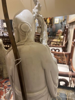 Lot 690 - Two Blanc de Chine Porcelain Figures of Shoulau Mounted as Lamps