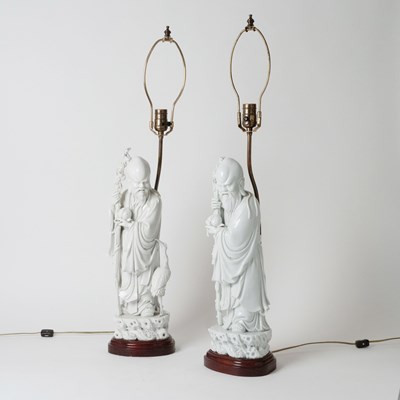 Lot 690 - Two Blanc de Chine Porcelain Figures of Shoulau Mounted as Lamps