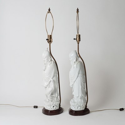 Lot 690 - Two Blanc de Chine Porcelain Figures of Shoulau Mounted as Lamps