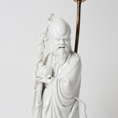 Lot 690 - Two Blanc de Chine Porcelain Figures of Shoulau Mounted as Lamps
