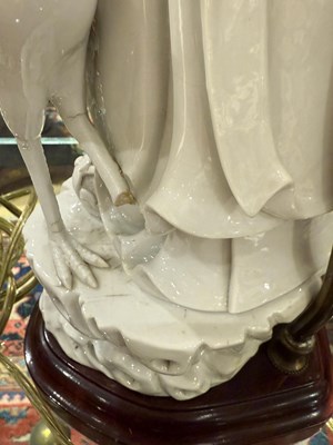Lot 690 - Two Blanc de Chine Porcelain Figures of Shoulau Mounted as Lamps