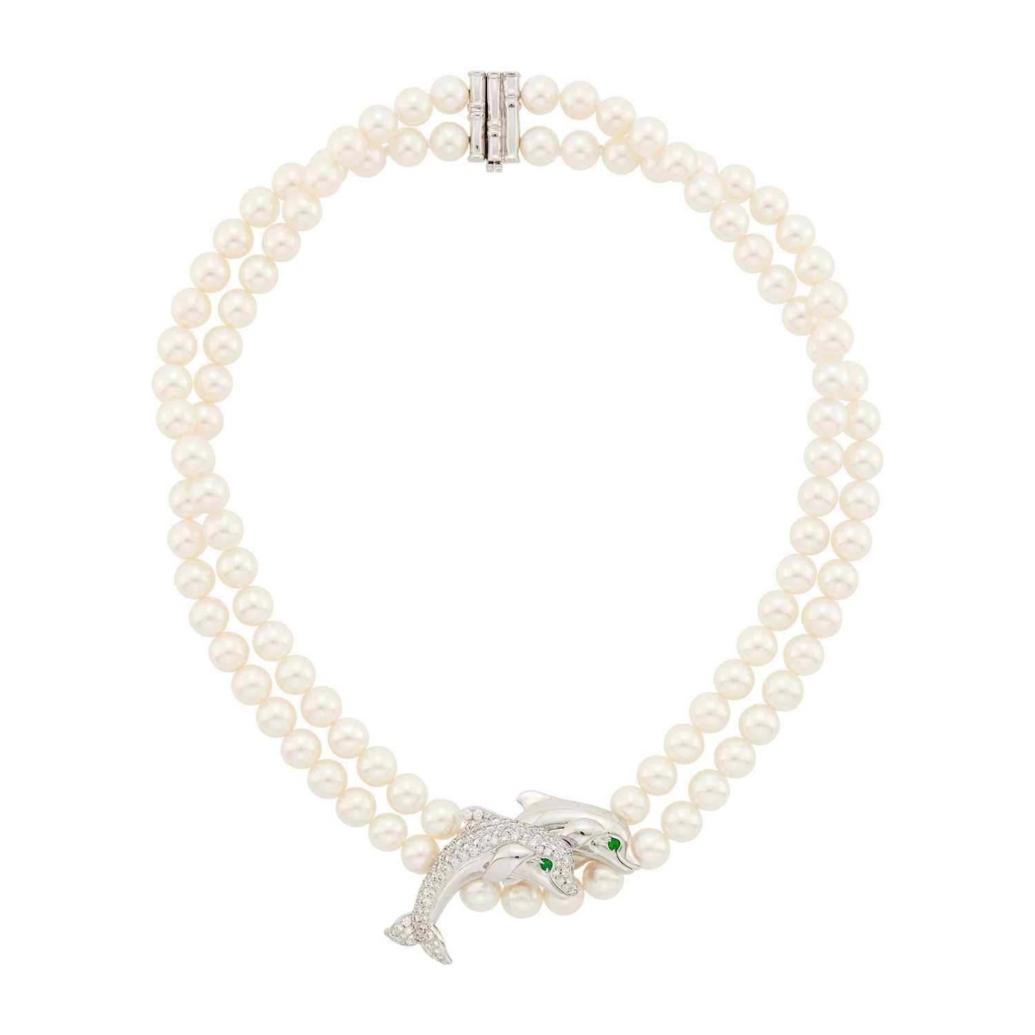 Lot 1137 - Cartier Double Strand Cultured Pearl, White Gold and Diamond Dolphin Necklace, France