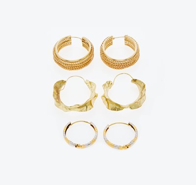 Lot 3315 - Three Pairs of Two-Color Gold Hoop Earrings