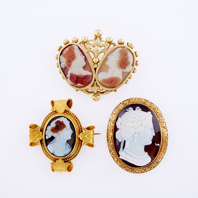 Lot 3178 - Three Gold, Low Karat Gold and Sardonyx Cameo Brooches