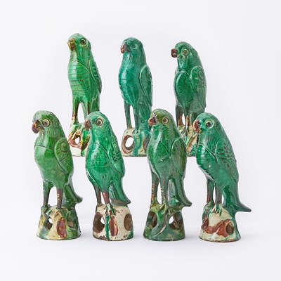 Lot 120 - Seven Chinese Export Green-Glazed Pottery Figures of Parrots