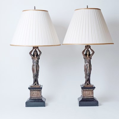 Lot 704 - A Pair of Empire Style Patinated Bronze and Black Marble Figural Table Lamps