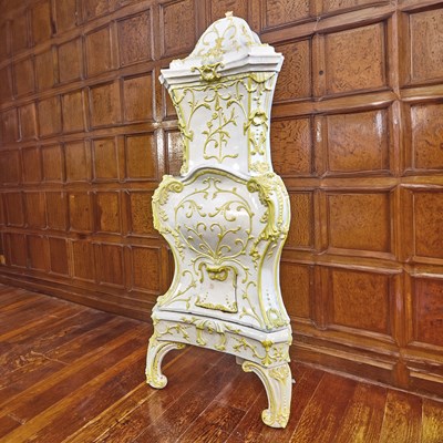 Lot 705 - Southern European Rococo Style Yellow and White Glazed Majolica Stove