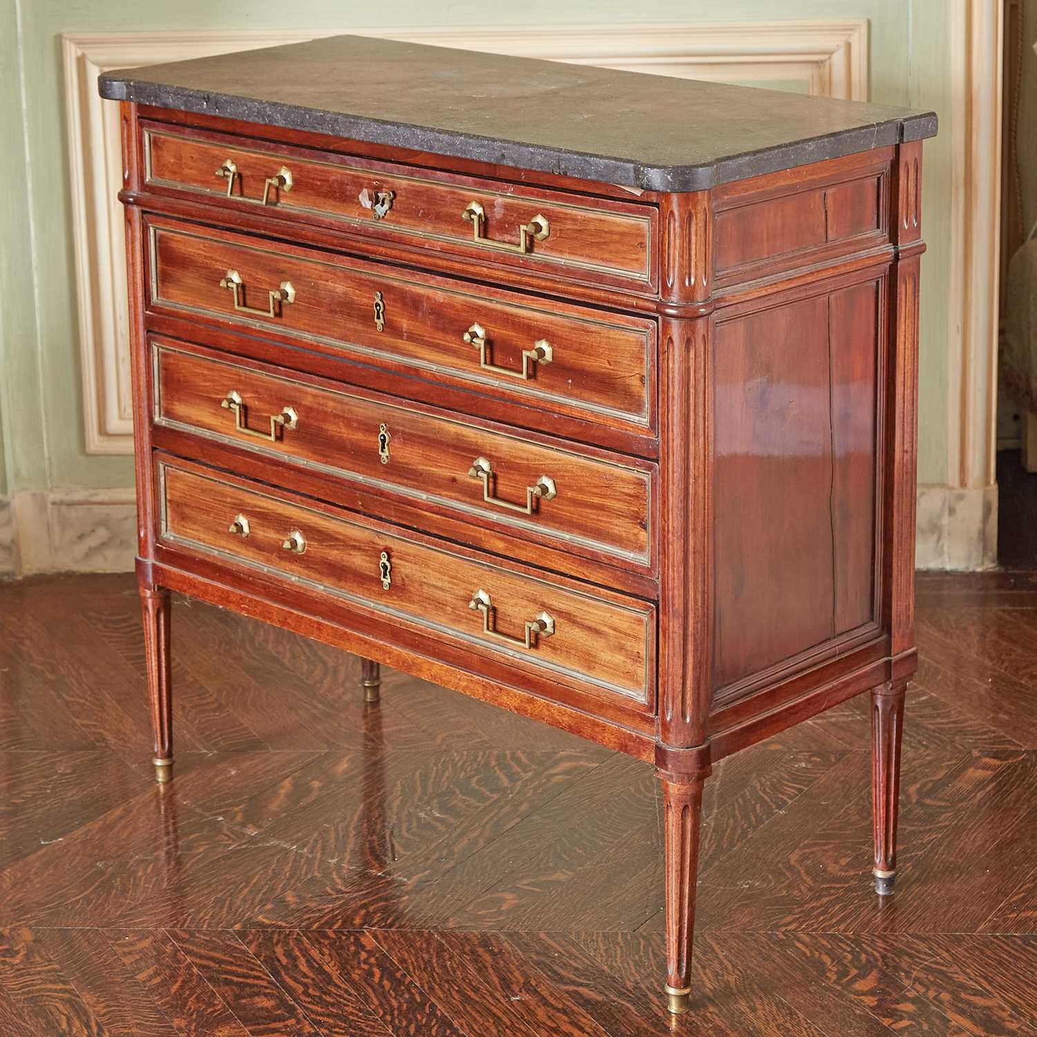 Lot 557 - Louis XVI Mahogany Commode with a Grey marble top