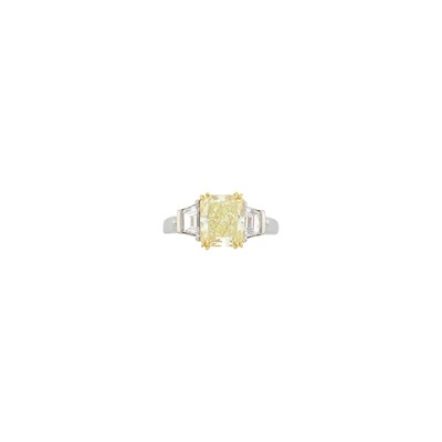Lot 2107 - Platinum, Gold, Fancy Yellow Diamond and Diamond Ring