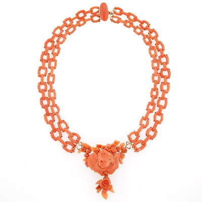 Lot 2130 - Antique Double Strand Carved and Coral Link, Gold and Silver Cherub Necklace
