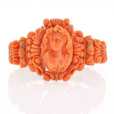 Lot 2138 - Antique Carved Coral Cameo and Silver-Gilt Bangle Bracelet