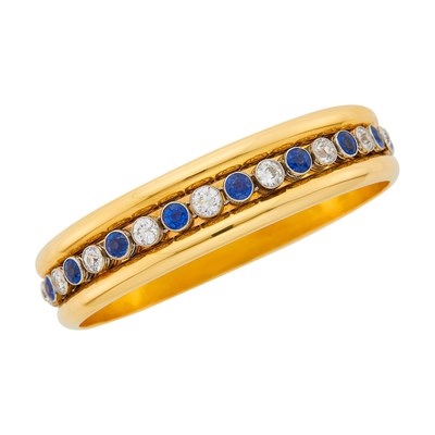 Lot 2044 - Gold, Platinum, Diamond and Sapphire Bangle Bracelet