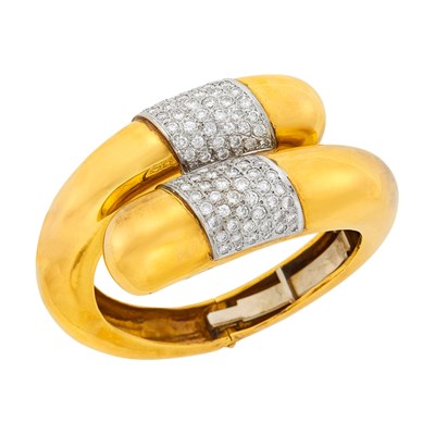 Lot 2029 - Two-Color Gold and Diamond Crossover Bangle Bracelet