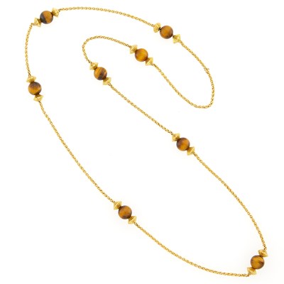 Lot 1153 - Long Gold and Tiger's Eye Bead Necklace