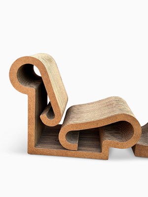 Lot 1110 - Frank Gehry Cardboard and Masonite Lounge Chair and Ottoman