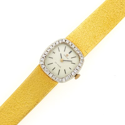 Lot 3233 - Omega Two-Color Gold and Diamond 'De Ville' Wristwatch