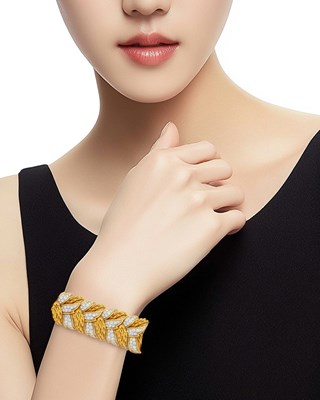 Lot 162 - Wide Gold, Platinum and Diamond Leaf Bracelet, France