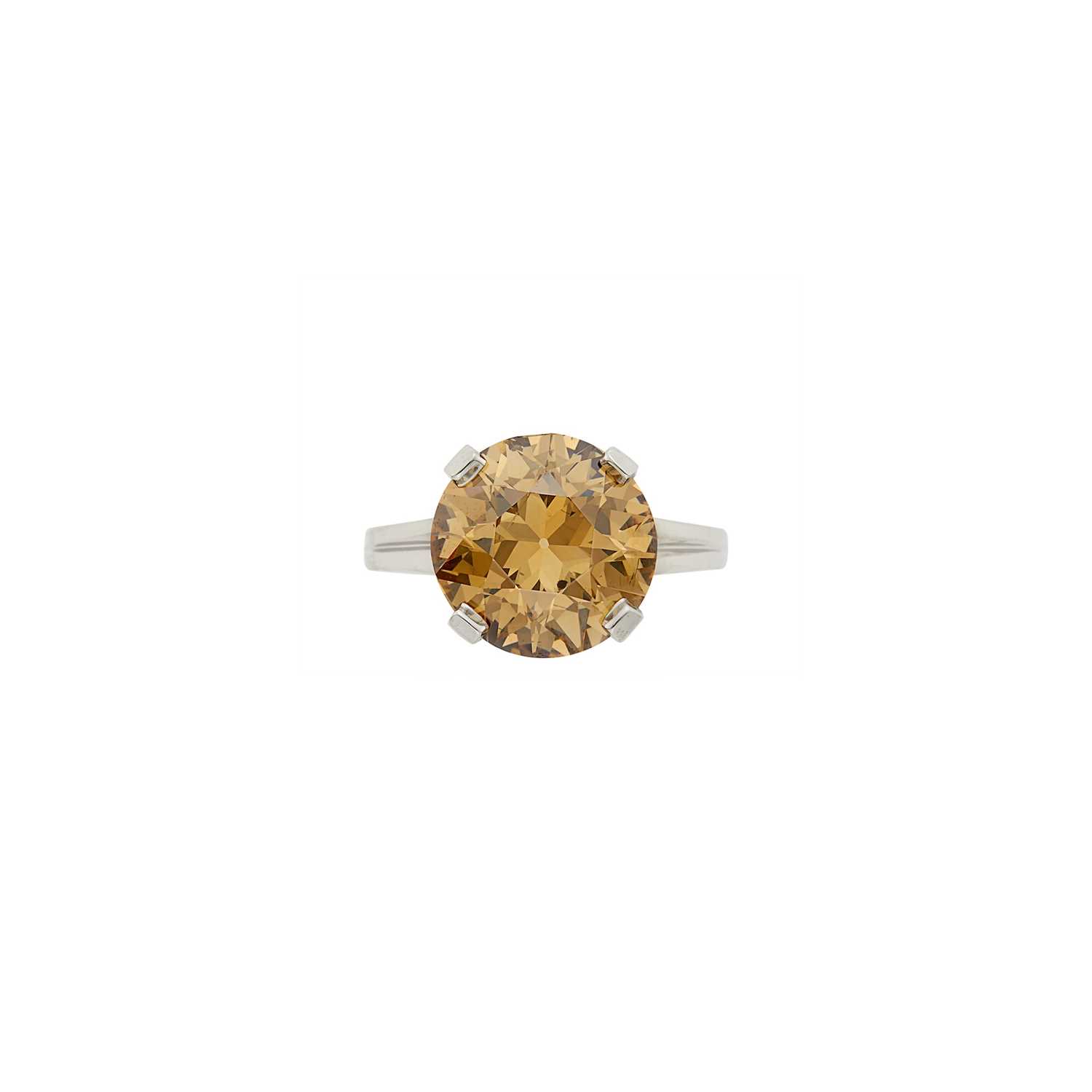 Lot 159 - Platinum and Fancy Yellow-Brown Diamond Ring