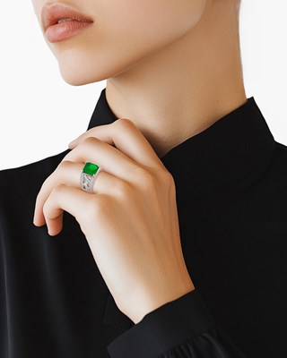 Lot 1145 - Platinum, Emerald and Diamond Ring