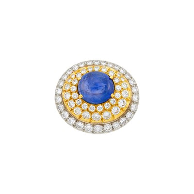 Lot 2069 - Two-Color Gold, Cabochon Sapphire and Diamond Clip-Brooch