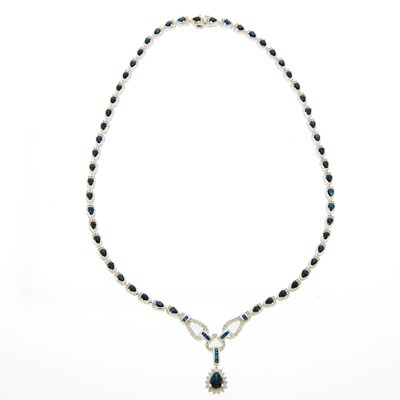 Lot 187 - White Gold, Diamond and Sapphire Pendant-Necklace
