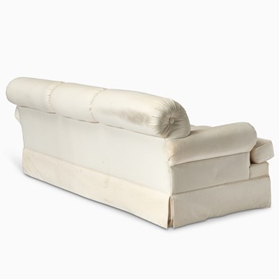 Lot 511 - Cream Colored Upholstered Three-Seat Sofa